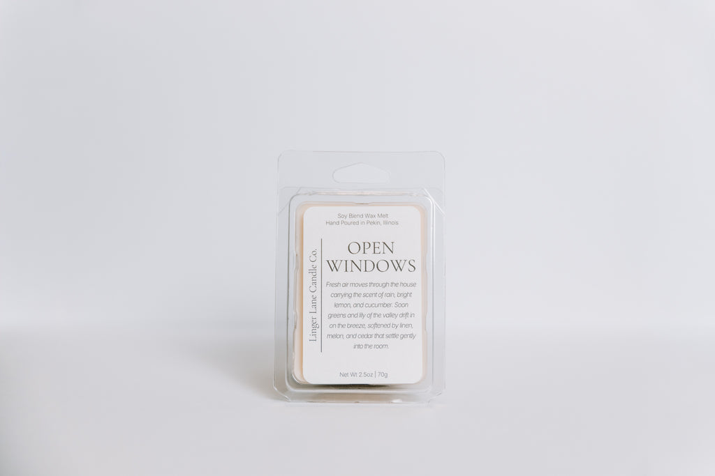 Candle melt wax bar with 'Open Windows' label on a white background