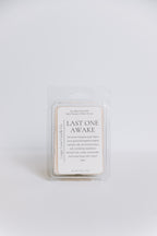 Wax melt packaging labeled 'Last One Awake' on a white background